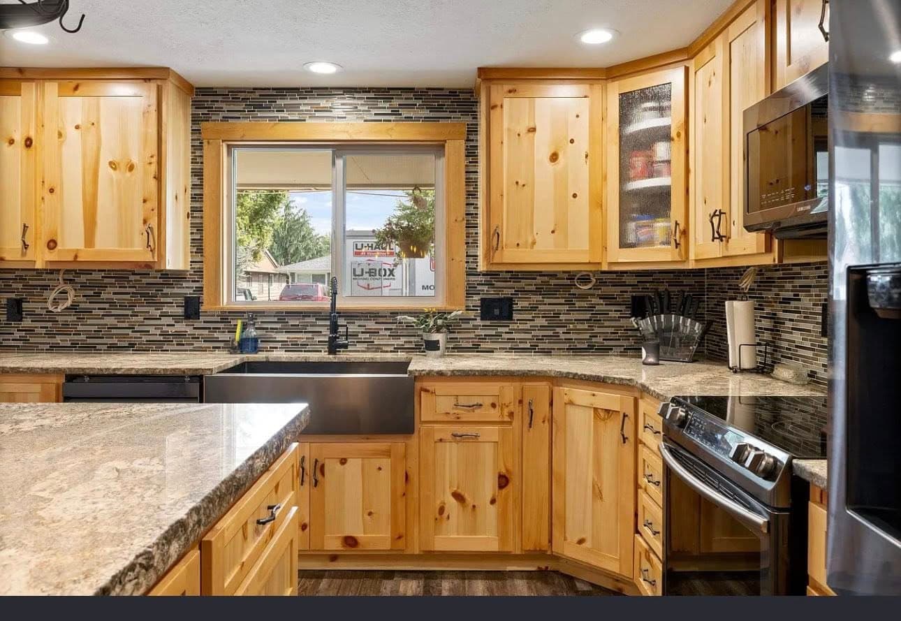 Finished kitchen renovation with custom cabinetry
